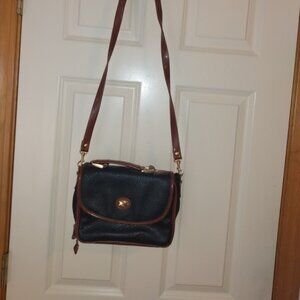 Style studio: Black & brown pebble grain cross body bag.